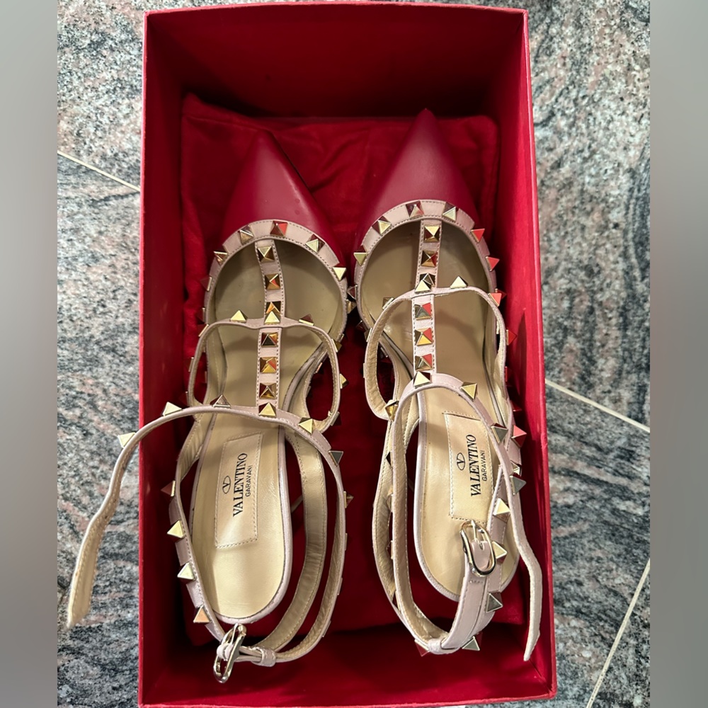 Worn a few times. Authentic classic Valentino